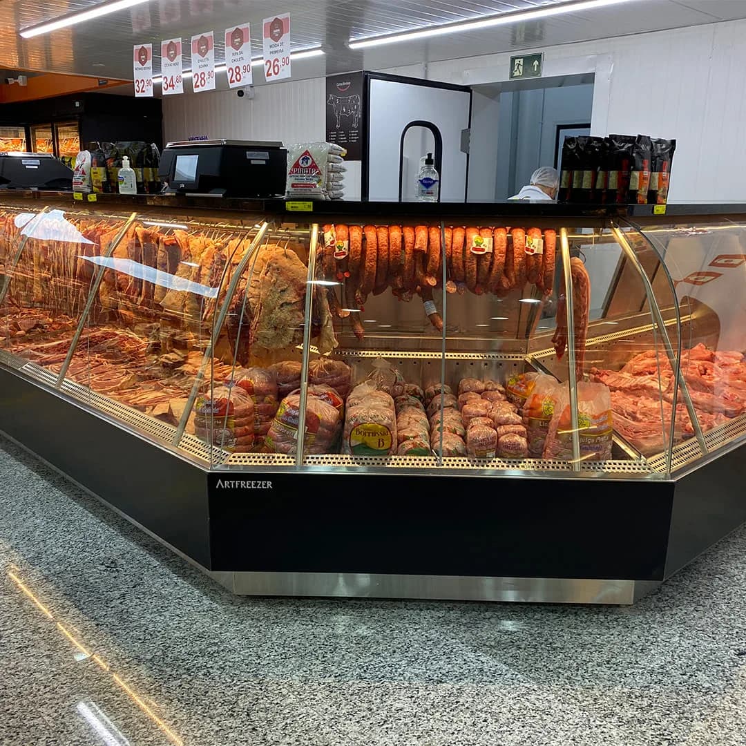 Butcher's refrigerated counter with curved glass